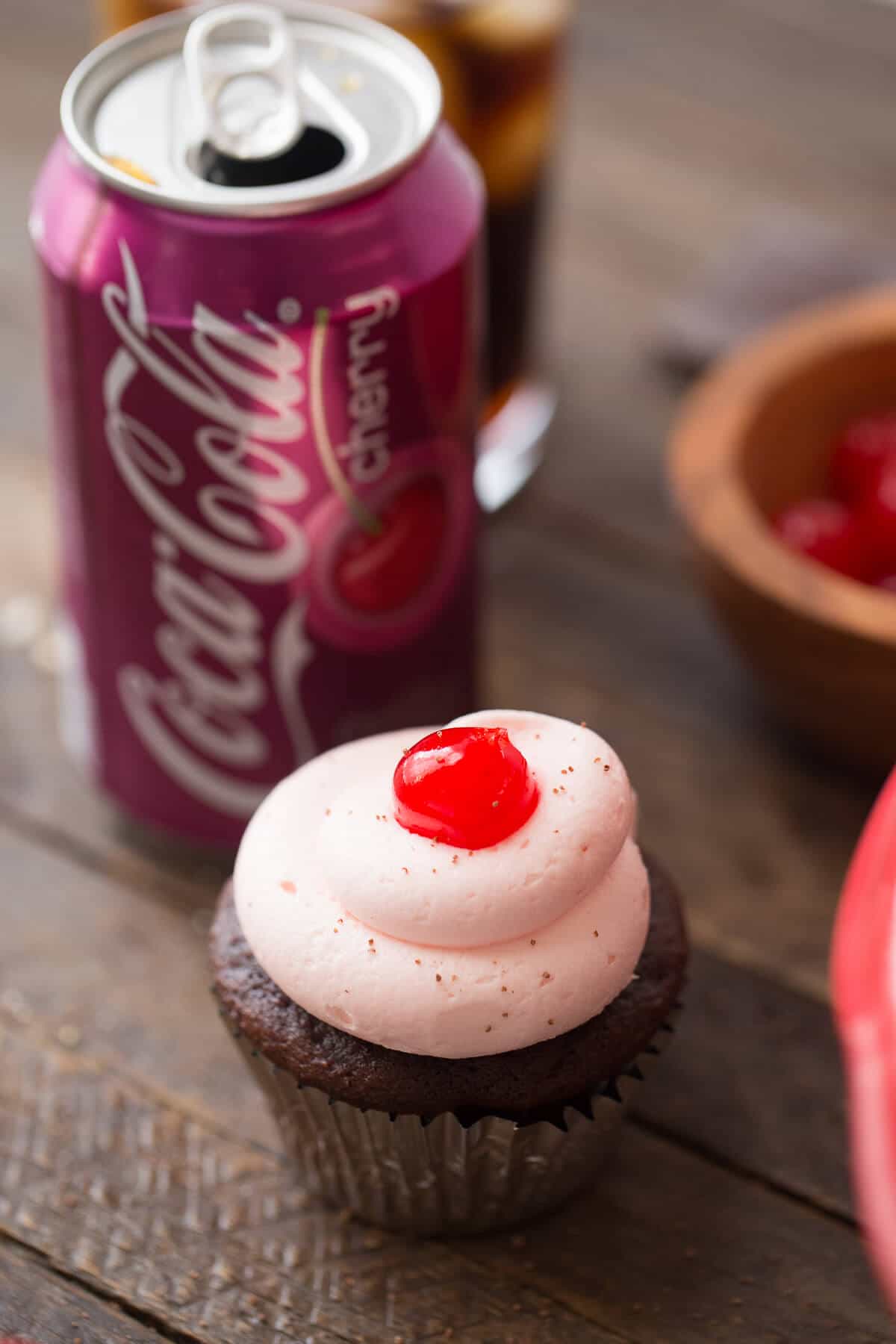 Cherry Coke cupcakes are flirty and fun! The chocolate cupcake is rich and the buttercream is sweet. It is the perfect cupcake!
