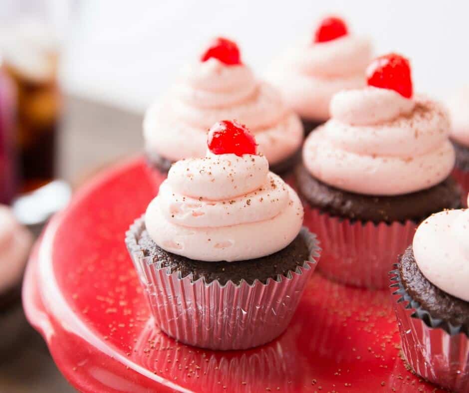 Everyone loves cupcakes, and I know you are going to love these fun Cherry Coke Cupcakes! The chocolate cake and the cherry buttercream are amazing together!