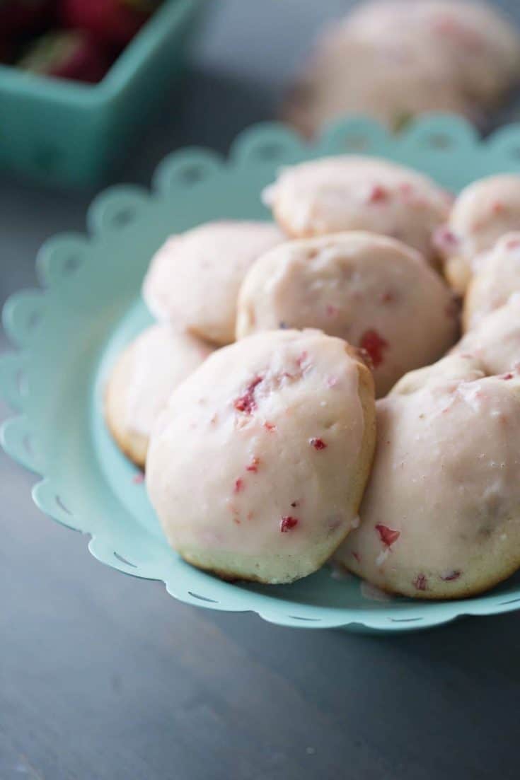 Ricotta cookies are soften tender little sweets. Each cookie is packed with chopped fresh strawberries in the cookie and in the silky glaze on top!