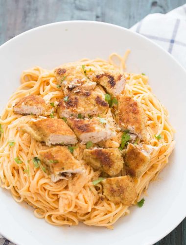 Chicken fettuccine alfredo like you've never tasted! Pasta noodles are coated with a light and creamy buffalo flavored alfredo sauce then topped with seasoned baked chicken!