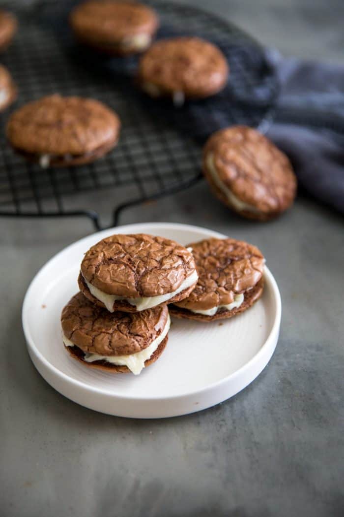 Three sandwich cookies on a plate