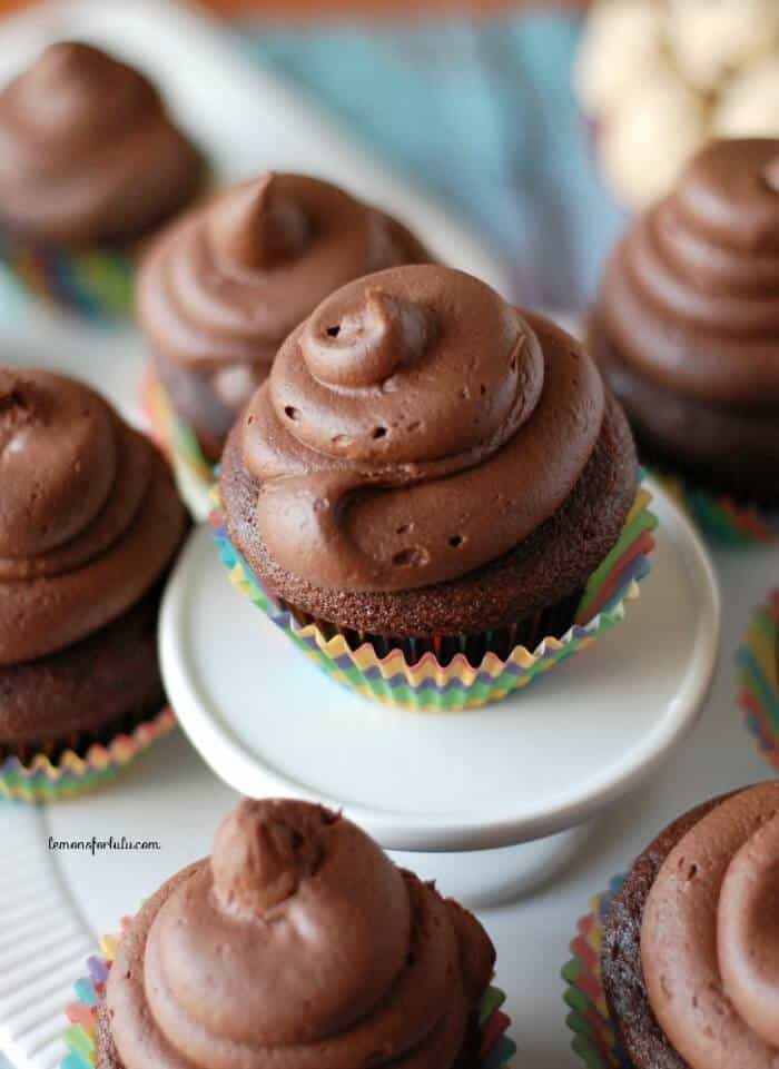 Chocolate cupcakes filled with chocolate chip cookie dough and topped with mocha frosting www.lemonsforlulu.com