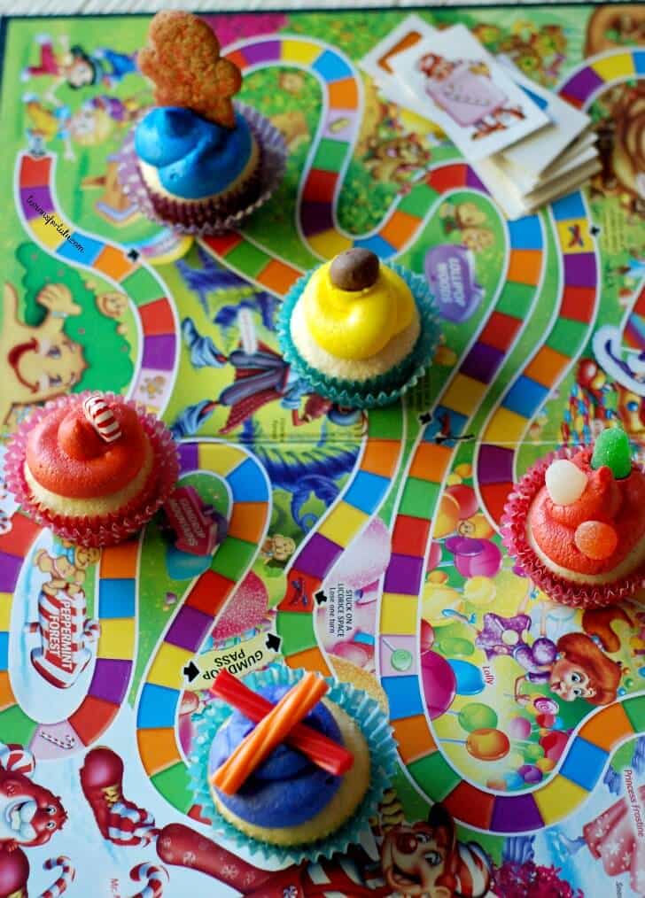 Candy Land cupcakes on a Candy Land board game. 
