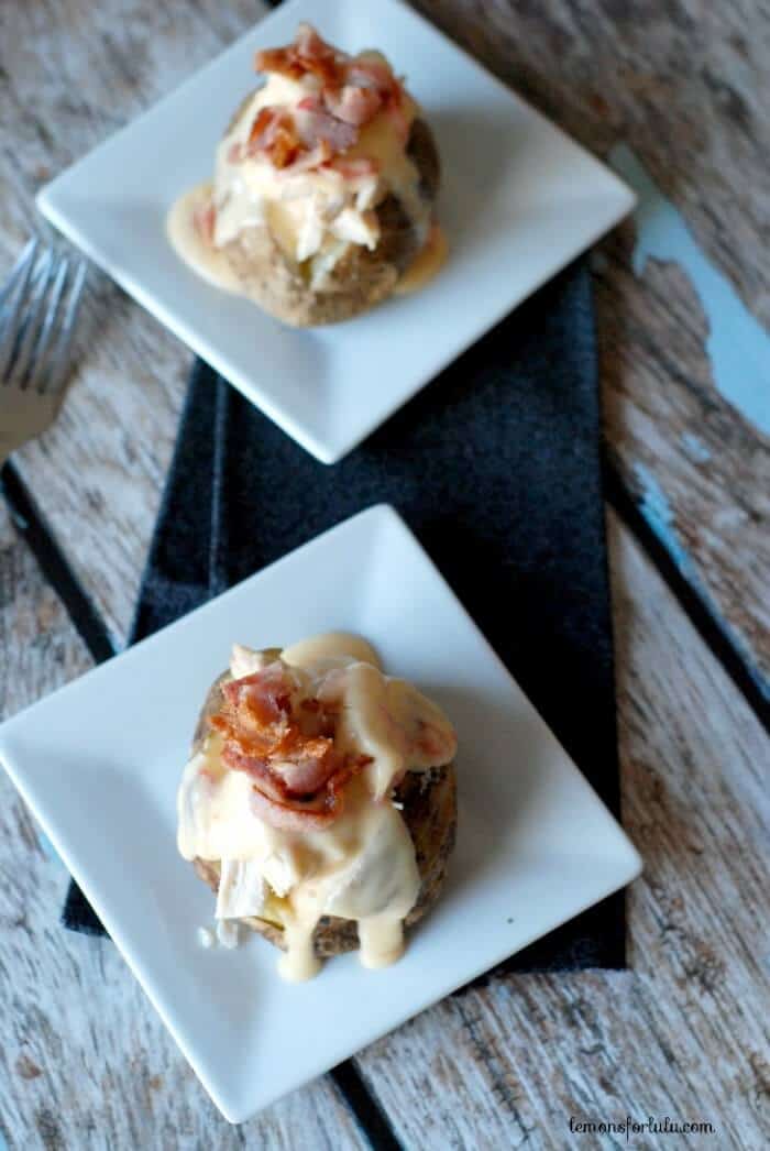 Hot Brown Baked Potato | lemonsforlulu.com, oven baked baked potato topped with chicken, a rich cheese sauce and crispy bacon!