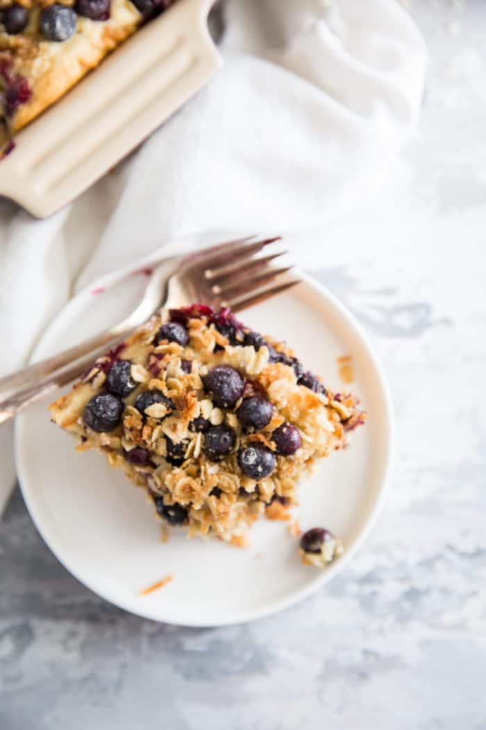 blueberry coffee cake piece with two forks