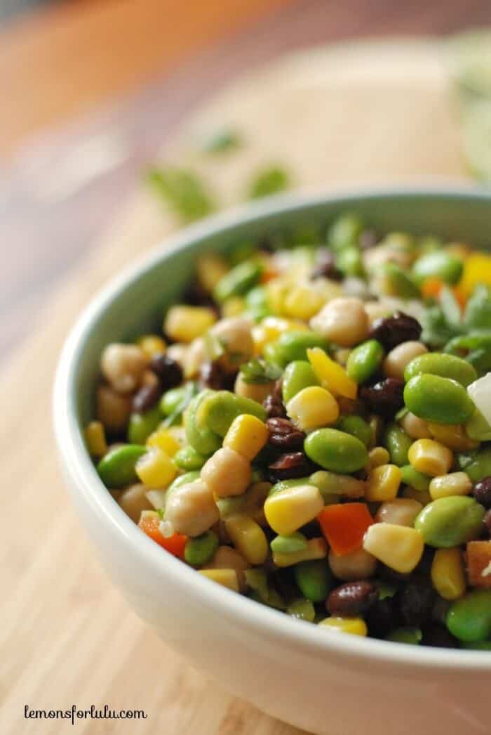 Black beans, corn, garbanzo beans and edamame are tossed with a southwestern flavored vinaigrette! www.lemonsforlulu.com 