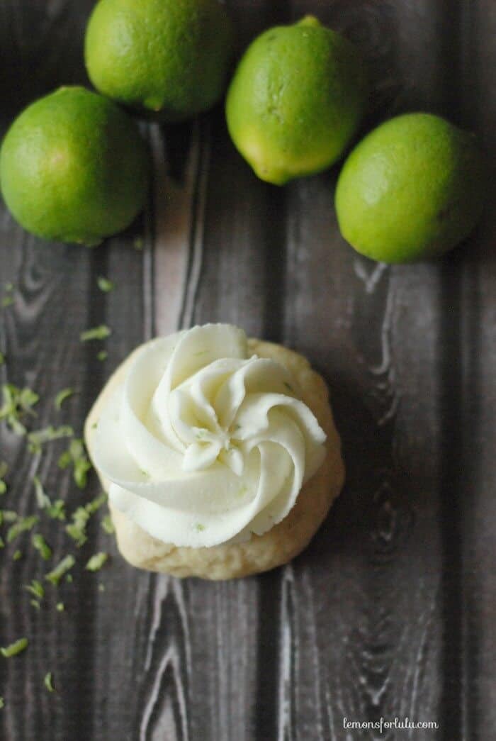 Soft, frosted mini sugar cookies made with fresh key limes! www.lemonsforlulu.com