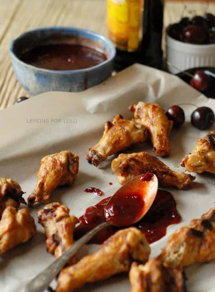 This cherry Kahúa BBQ sauce will knock your socks off! This sweet bbq sauce dresses up anything you want to grill! www.lemonsforlulu.com #sponsored #KahlúaSummer