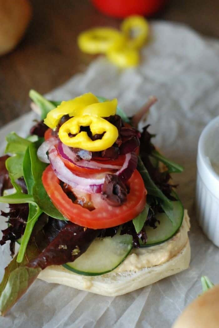 Vegetarian Sandwiches with a Greek flair! Inside you’ll find hummus, veggies, feta and tzitziki sauce! www.lemonsforlulu.com