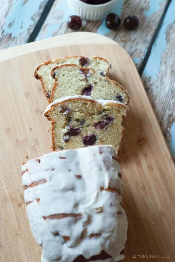 Cherry Almond Quick Bread - This quick bread is the perfect way to use up seasonally fresh cherries! Recipe at lemonsforlulu.com