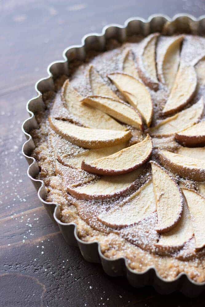 This easy apple tart takes not time to prepare but looks completely impressive! A fool proof crust and a creamy peanut butter filling will have you saying goodbye to traditional apple pie! www.lemonsforlulu.com