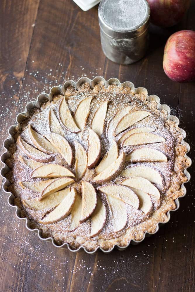 This easy apple tart takes not time to prepare but looks completely impressive! A fool proof crust and a creamy peanut butter filling will have you saying goodbye to traditional apple pie! www.lemonsforlulu.com #WalmartProduce