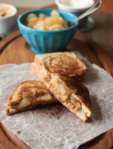 4 slices cinnamon bread 2 teaspoons butter 1 cup apple pie filling ¼ cup whipped peanut butter 2 tablespoons whipped cream cheese