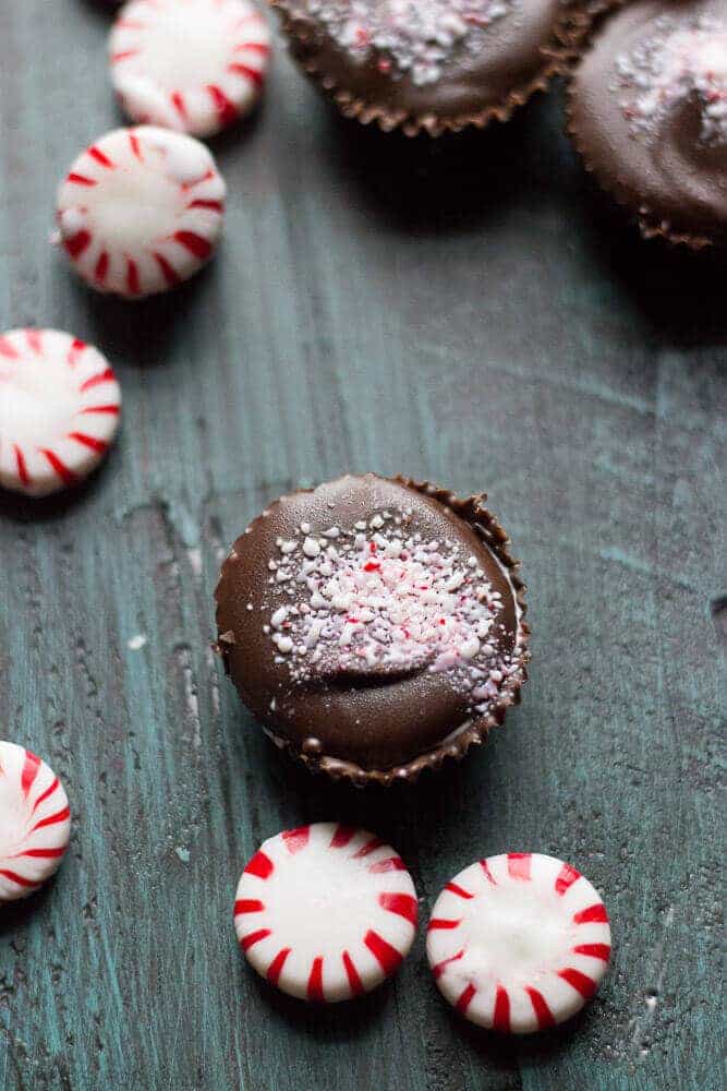 Homemade marshmallow cream is flavored with peppermint candies and tucked inside a chocolate cup! www.lemonsforlulu.com