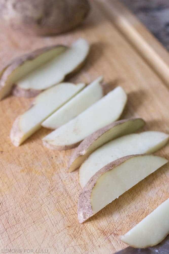 Potato wedges, soon to become Bacon Wrapped Roasted Potatoes with Harissa Aioli_