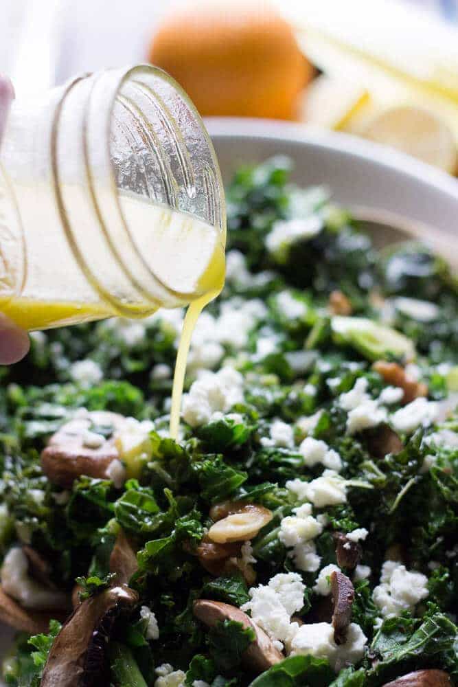 This wilted kale salad is packed with goodness, between the baby bella mushrooms, the toasted walnuts and the fresh citrus vinaigrette! Each bite is a powerful mouthful! www.lemonsforlulu.com #SplendaSweeties #SweetSwaps
