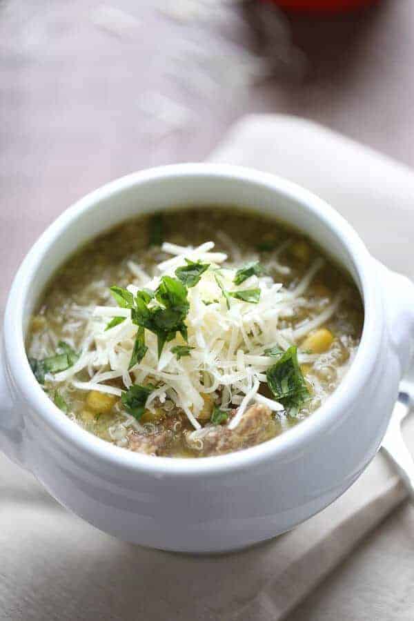 Quinoa chili verde is filling and satisfying with it’s smoky vegetables, flavorful pork and healthy quinoa! lemonsforlulu.com