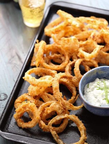 You won’t be able to stop with just one crispy onion ring! The bbq spiced rings are tender on the inside but crunchy on the outside. The blue cheese sauce is the perfect dip! lemonsforlulu.com
