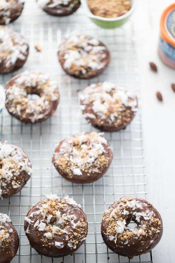 Almond Coconut donuts have lots of chocolate, sweet coconut and crunchy almonds! lemonsforlulu.com