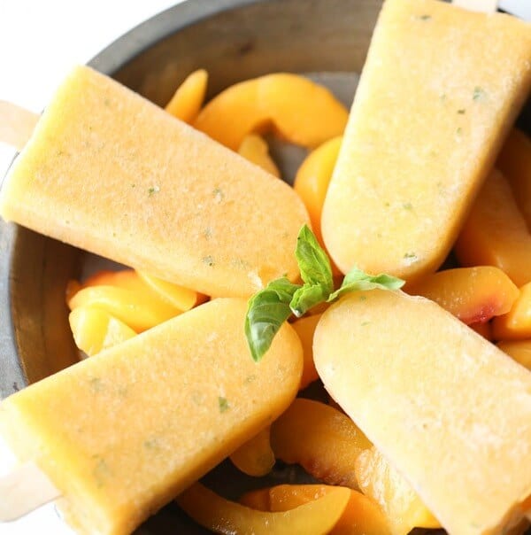 Margarita on stick, that’s what these boozy treats are with their fresh basil and sweet peaches! lemonsforlulu.com