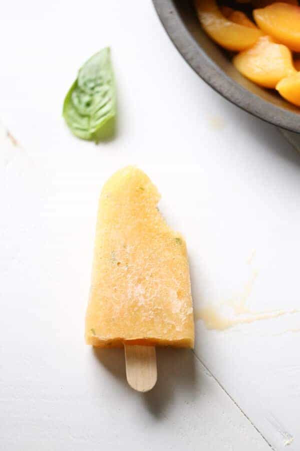A new frozen margarita! Basil peach margarita popsicles! lemonsforlulu.com