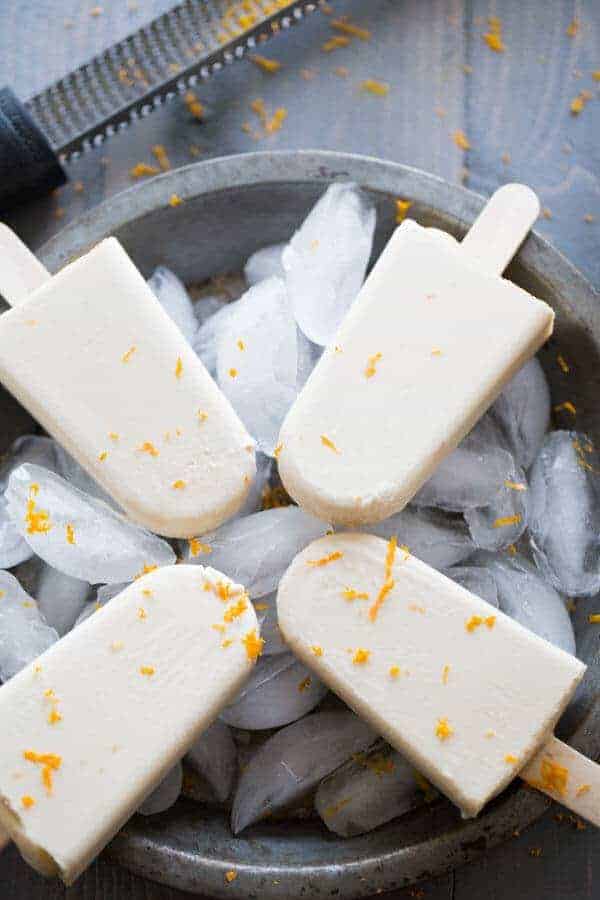 Creamy gelato popsicles infused with rich Chai Tea Latte and fresh citrus zest! lemonsforlulu.com #IDelightInChai