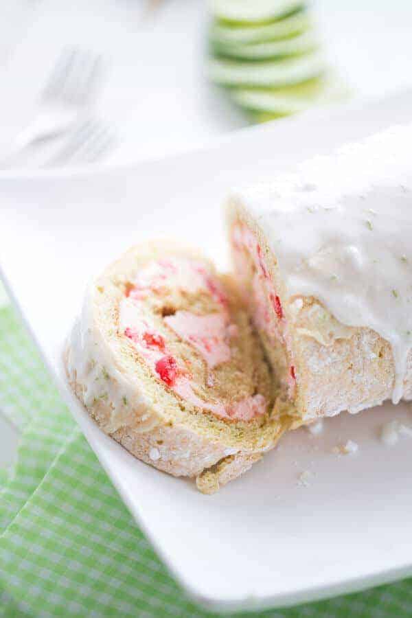 Vanilla cake roll wrapped around a sweet cherry filling and topped with a tart lime glaze! lemonsforlulu.com