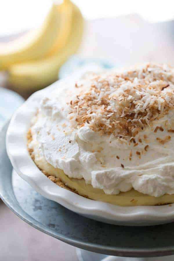 Coconut banana cream pie has a thick custard base, packed with the tropical taste of coconut and roasted bananas! lemonsforlulu.com