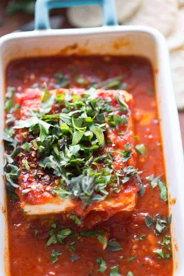 Baked feta appetizer that is spicy, saucy, savory and fresh! lemonsforlulu.com
