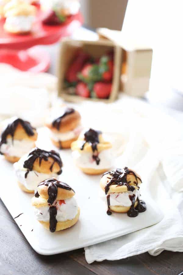 Strawberries and cream make the perfect light filling for this simpmle pastry dessert! lemonsforlulu.com