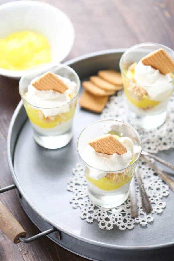 Lemon pie filling is surrounded by a creamy white chocolate mousse in this easy parfait recipe. lemonsforlulu.com