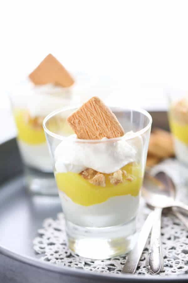 A simple and quick white chocolate mousse surround a lemon pie filing is all that is needed to make these luscious parfaits! lemonsforlulu.com