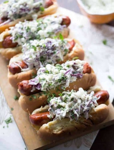 Flavorful andouille sausage is covered in a creamy, cool blue cheese coleslaw! lemonsforlulu.com