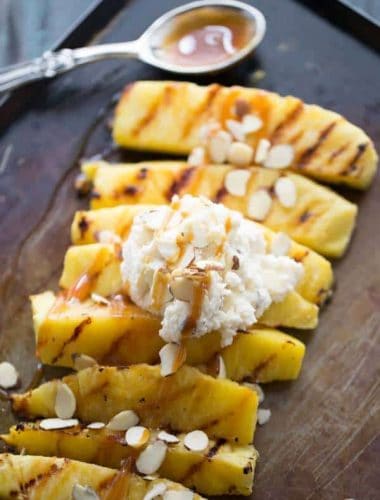 Easy Grilled Pineapple is sweet and delicious! Serve it with a simple mascarpone whipped cream! lemonsforlulu.com