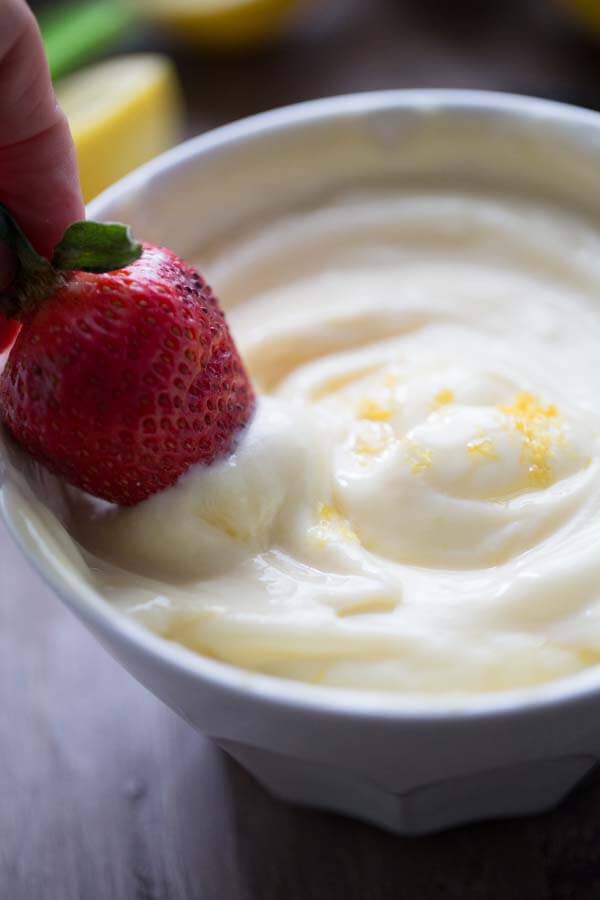 A creamy fruit dip recipe that is so simple you won’t believe it! Homemade lemon curd and honey flavored yogurt combine for a simple, sweet fruit dip recipe! lemonsforlulu.com #AusseStyle #Ad