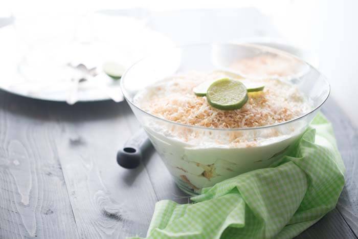 Whipped cream, cream cheese and key lime juice are layered with angel food cake in this quick and easy trifle recipe! lemonsforlulu.com