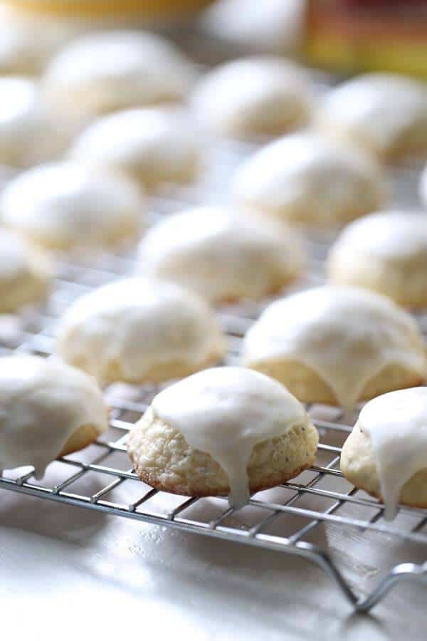 Soft sugar cookies with poppy seeds and lemons. A simple lemon frosting crowns the top! lemonsforlulu.com #SplendaSweeties #SweetSwaps #ad