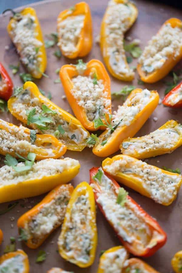 These stuffed pepper will blow you away! They start with crisp, sweet mini peppers that are stuffed with two kinds of cheese, kale and bacon. A flavor power house! They only take minutes to grill up; easy, perfect no fuss recipe! lemonsforlulu.com #ChoppedAtHome #ad