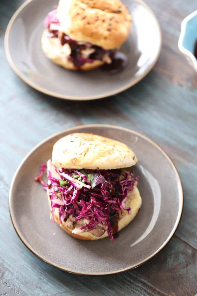 Pulled pork with a distinctly Asian taste. Ginger infused sauce, a crips slaw and spicy mayo will make this pork bbq sandwich taste out of this world! lemonsforlulu.com