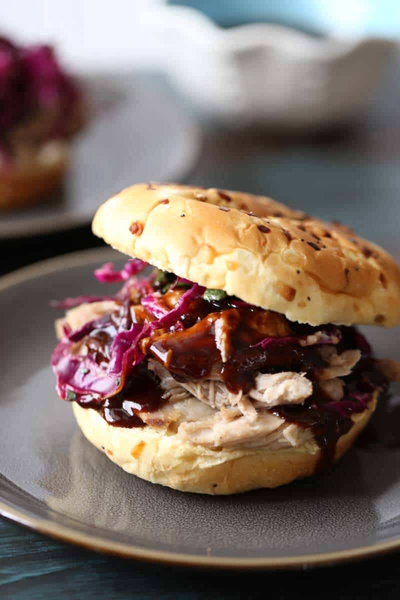This pulled pork recipe is fulled with Asian flavor. The bbq sauce is touched with ginger that is balanced perfectly by the tangly slaw. The wasabi mayo rounds out the flavors. lemonsforlulu.com