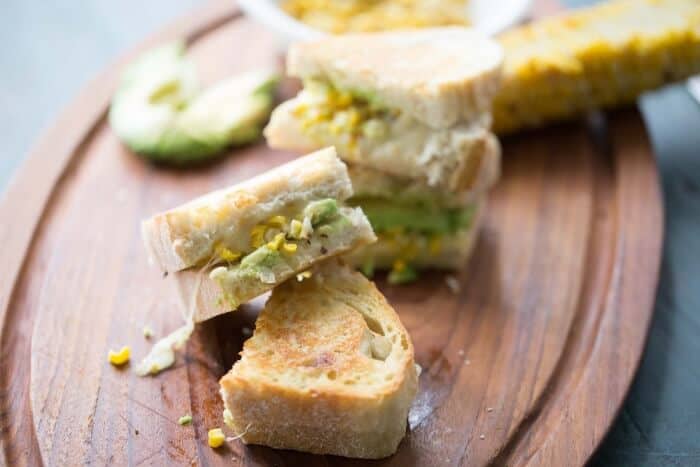 Creamy avocado and smokey grilled corn marry together in this easy grilled sandwich! lemonsforlulu.com
