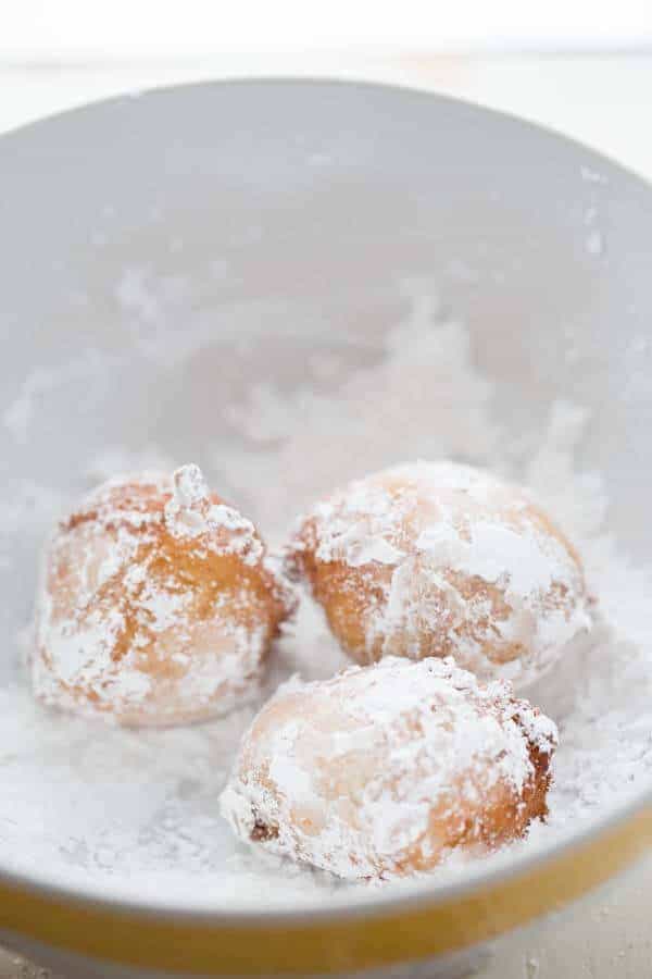 Italian style ricotta donuts are better than any store bought donut! They are fluffy and light and served with two very easy dipping sauces! lemonsforlulu.com