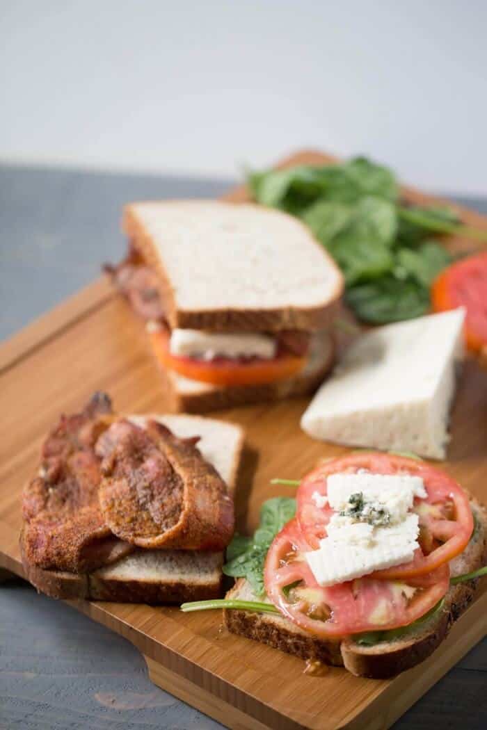 This BLT sandwich recipe will beat all others! It has bbq seasoned bacon and creamy blue cheese. The first bite will blow you away! lemonsforlulu.com