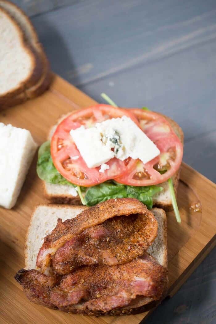 This gourmet BLT recipe features bbq seasoned bacon and thickly sliced blue cheese! lemonsforlulu.com
