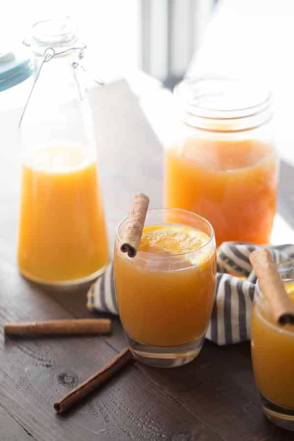 Hot apple cider, bourbon and a splash of juice; that's all thats needed for this belly-warming cocktail! lemonsforlulu.com