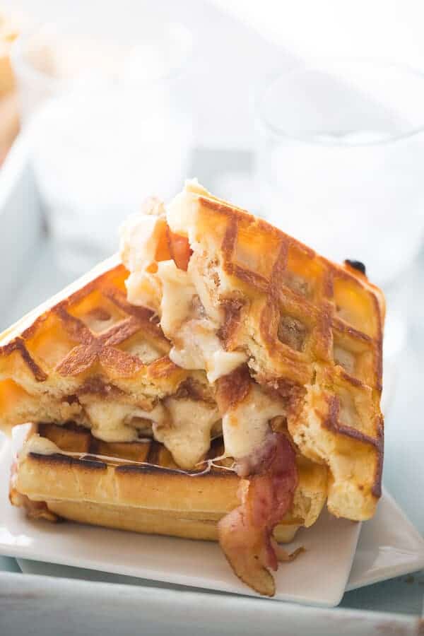 A simple waffle sandwich that is grilled with sweet apple butter, salty bacon and creamy fontina cheese! lemonsforlulu.com