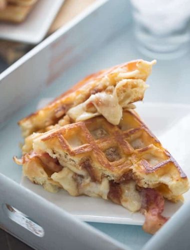 A savory waffle sandwich recipe with apple butter, bacon and fontina cheese! lemonsforlulu.com