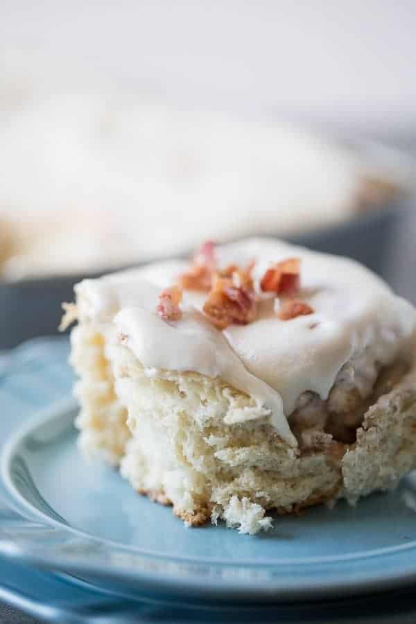 Homemade bacon cinnamon rolls with a sweet maple frosting. lemonsforlulu.com