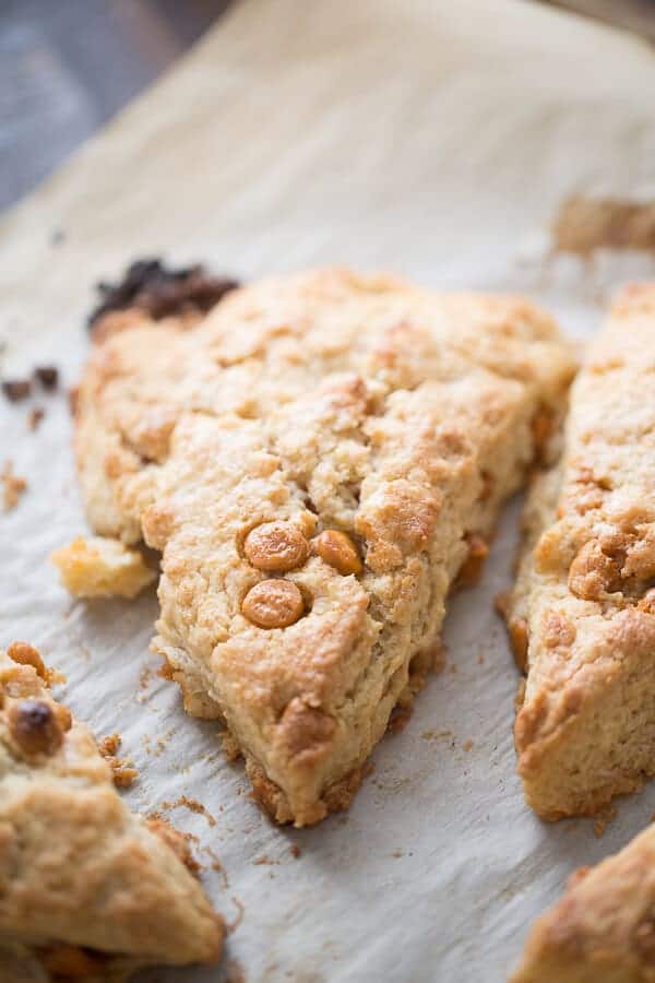  A simple scone recipe with maple syrup in the batter along with sweet butterscotch chips. A thick maple icing is drizzled on top! lemonsforlulu.com