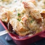 Savory bread pudding, creamy and cheesy, bursting with lemon and artichokes. No sweet bread pudding here! This savory treat is as delicious as it looks! | lemonsforlulu.com